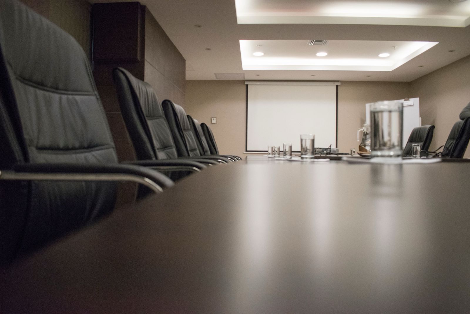 Boardroom table with panoramic city skyline view