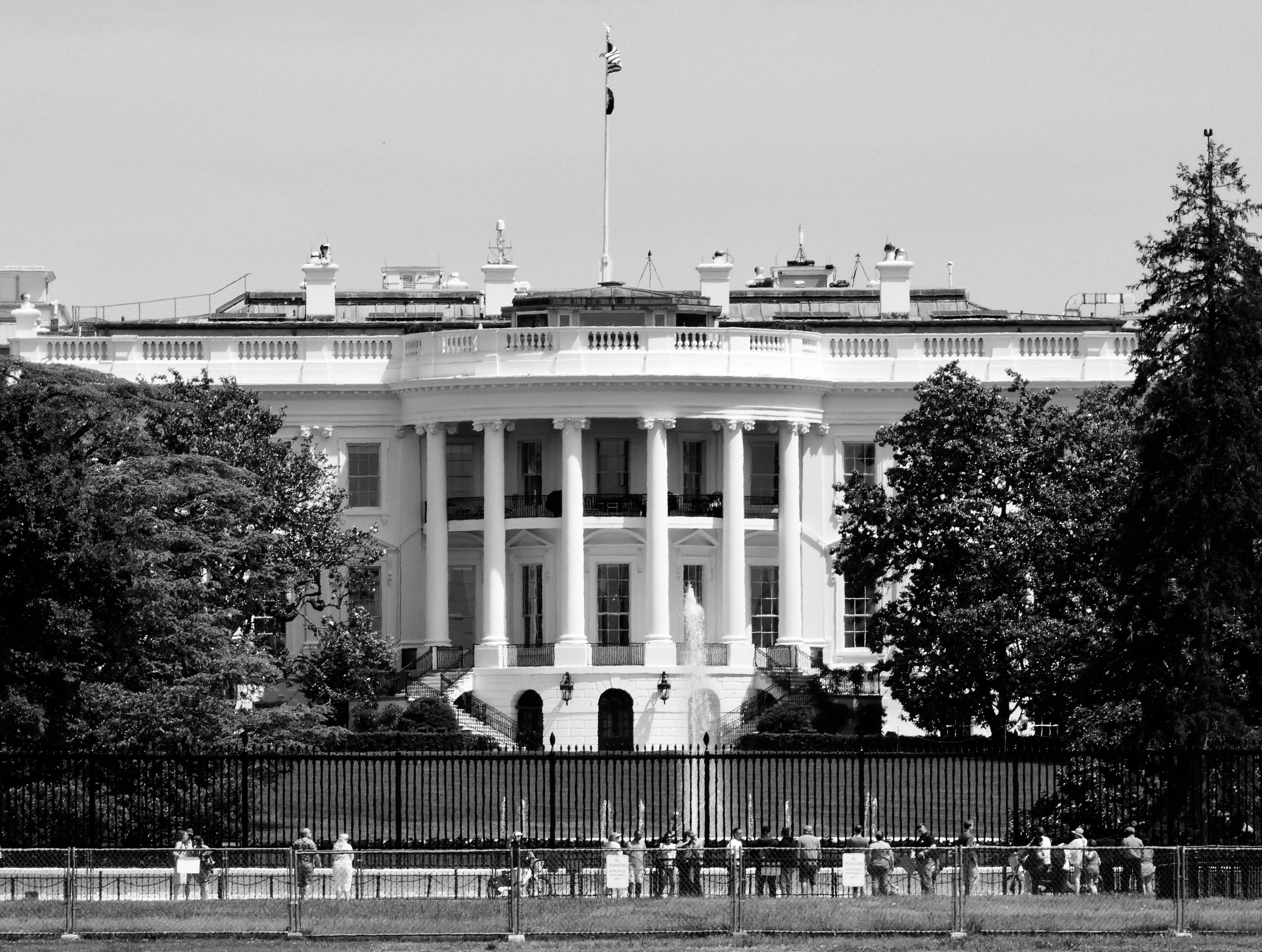 Black and white photo of the White House, a symbol of U.S. government, in Washington, DC